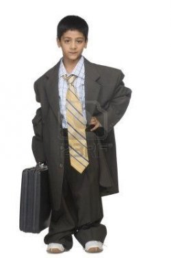 $10124375-portrait-of-a-boy-wearing-oversized-suit-and-holding-briefcase.jpg