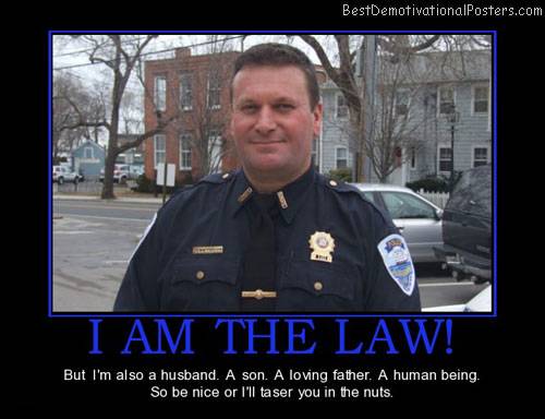 cop-law-taser-nuts-police-best-demotivational-posters.jpg
