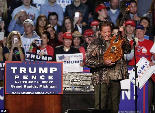 3A2A4C7100000578-3915630-Trump_meanwhile_relied_on_musician_Ted_Nugent_to_warm_the_crowd_-a-80_1478587449319.jpg