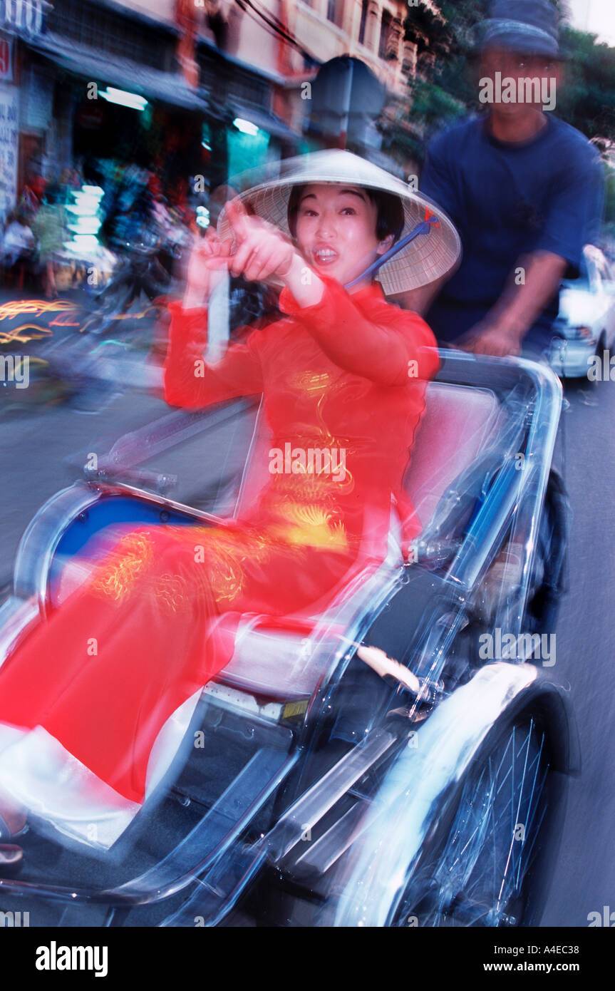 vietnamese-woman-on-rickshaw-A4EC38.jpg