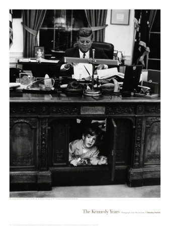 stanley-tretick-john-jr-playing-under-john-f-kennedy-s-oval-office-desk-1963.jpg