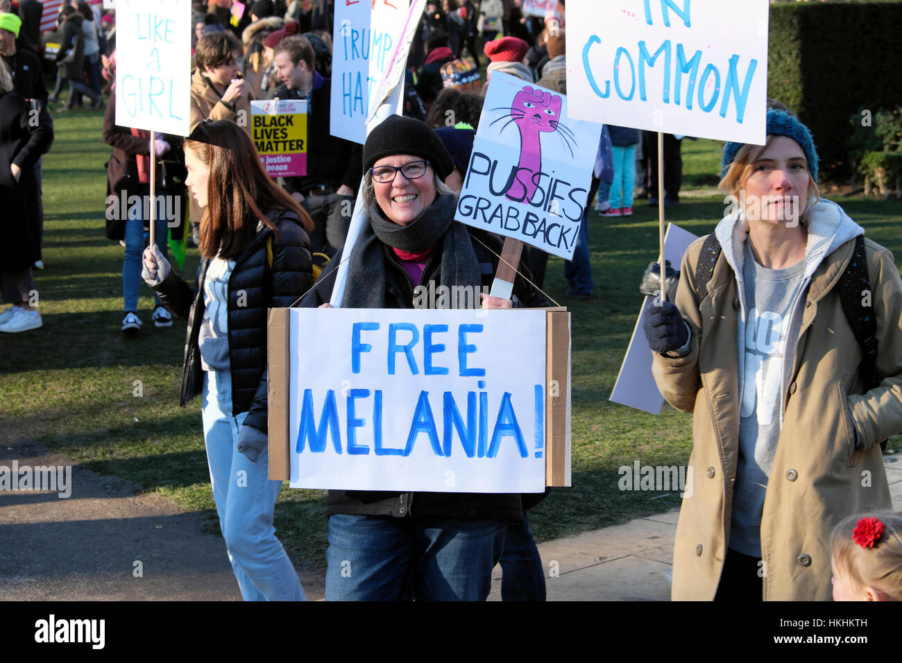 protesters-with-free-melania-poster-at-womens-march-on-london-outside-HKHKTH.jpg