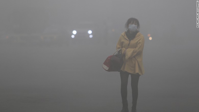 151022135937-smog-woman-2-mask-pollution-exlarge-169.jpg