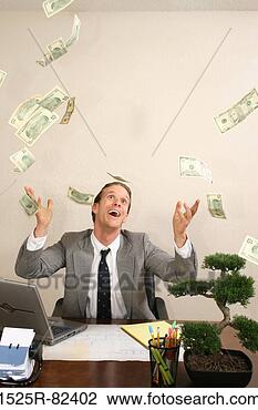 businessman-tossing-dollar_~1525R-82402.jpg