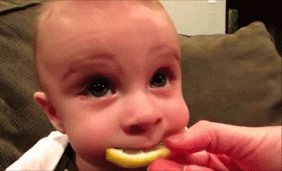 funny-pictures-baby-eating-lemon-animated-gif.gif