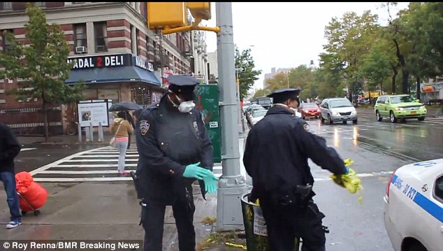 1414119284345_wps_59_NYPD_Police_take_down_cau.jpg