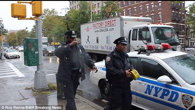 1414119371871_wps_65_NYPD_Police_take_down_cau.jpg