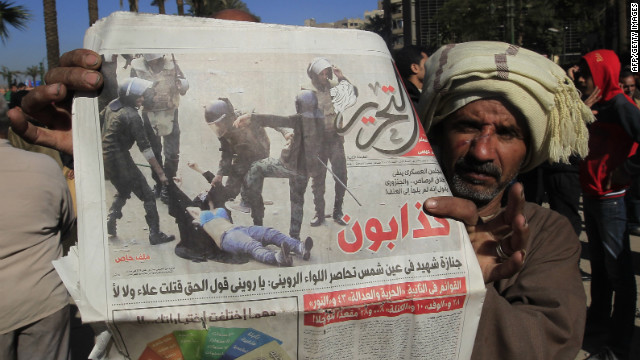 111218115620-egypt-newspaper-woman-beaten-story-top.jpg