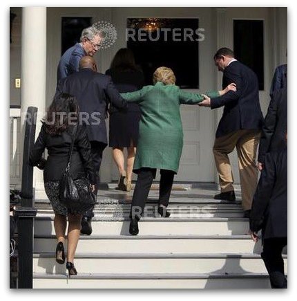 Hillary-being-helped-up-stairs-stroke.jpg