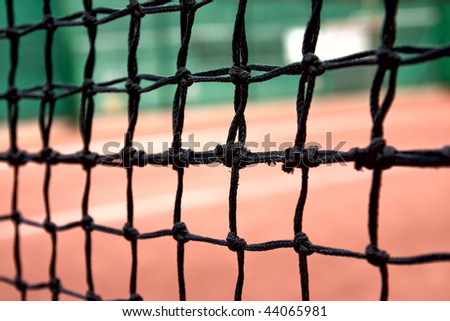 stock-photo-close-up-on-tennis-net-44065981.jpg