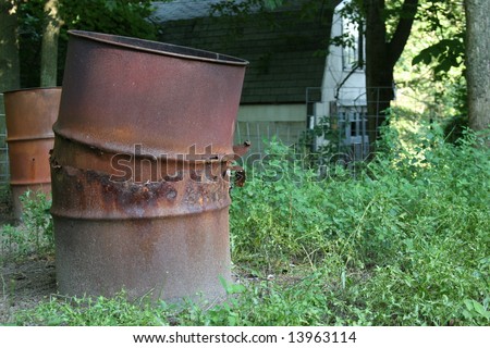 stock-photo-old-burn-barrel-13963114.jpg