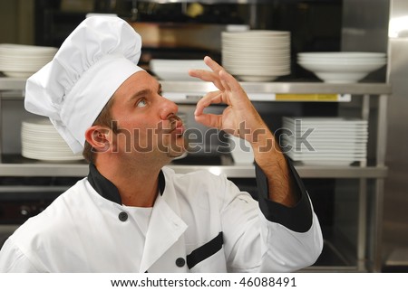stock-photo-attractive-caucasian-chef-kissing-his-fingers-to-show-how-tasty-the-food-is-46088491.jpg