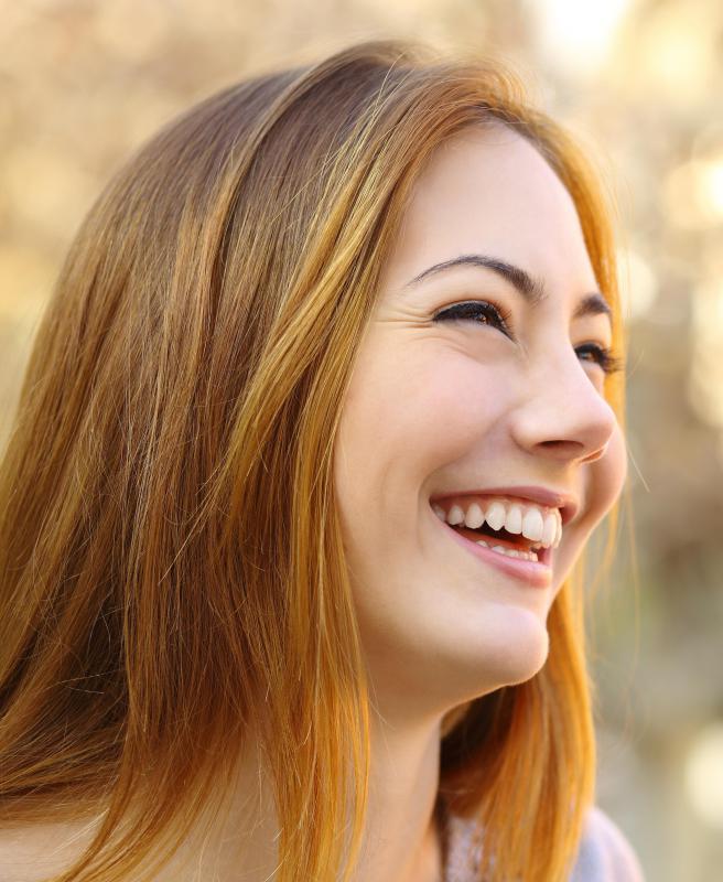 side-view-of-woman-with-long-hair-laughing.jpg