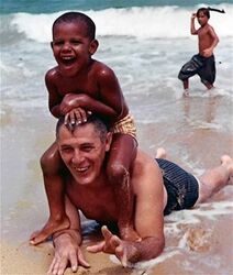 212px-Barack_Obama_as_boy_with_Stanley_Dunham_on_beach.jpg
