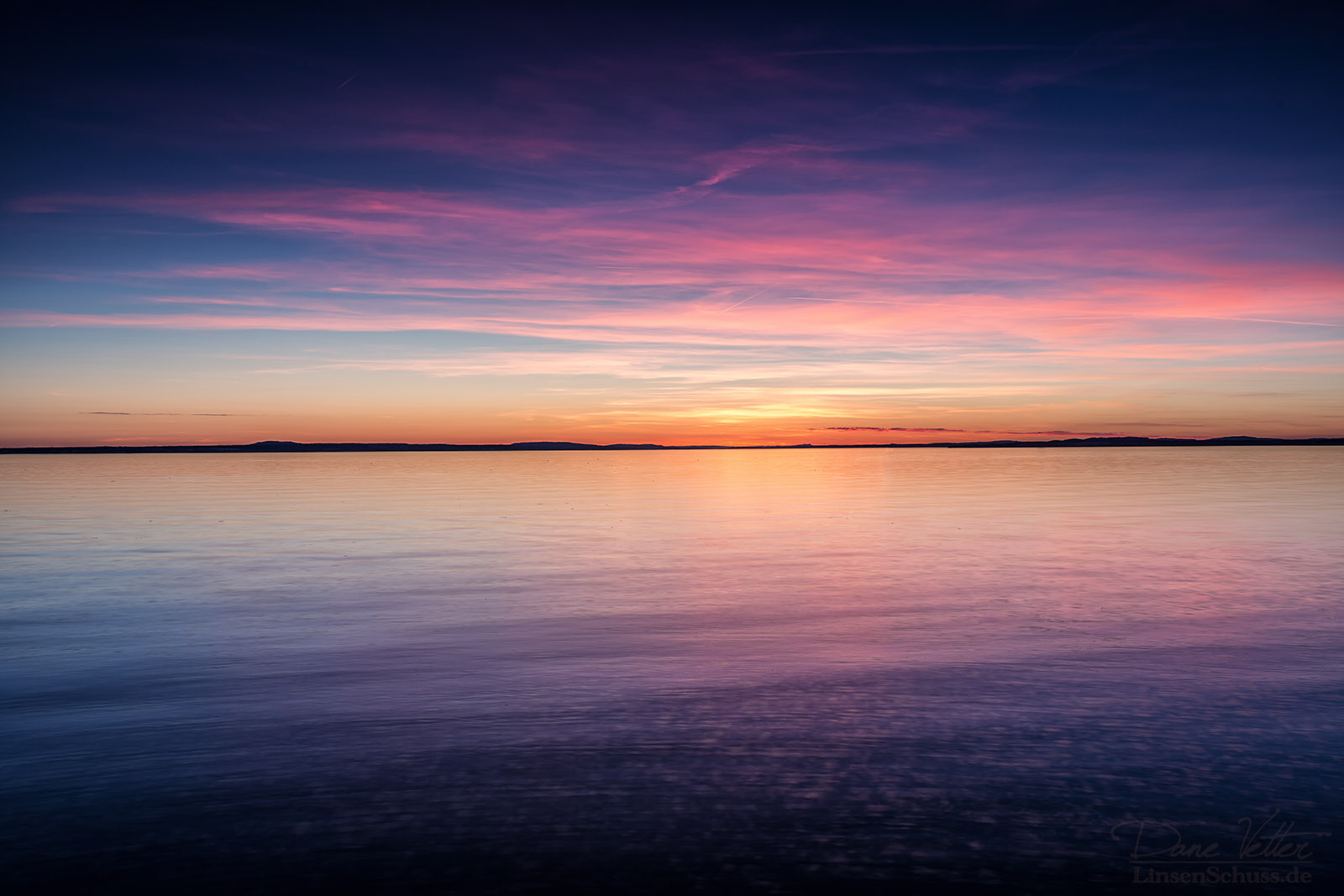 the_colorful_sunset_on_lake_constance_by_linsenschuss-d61tu9p.jpg