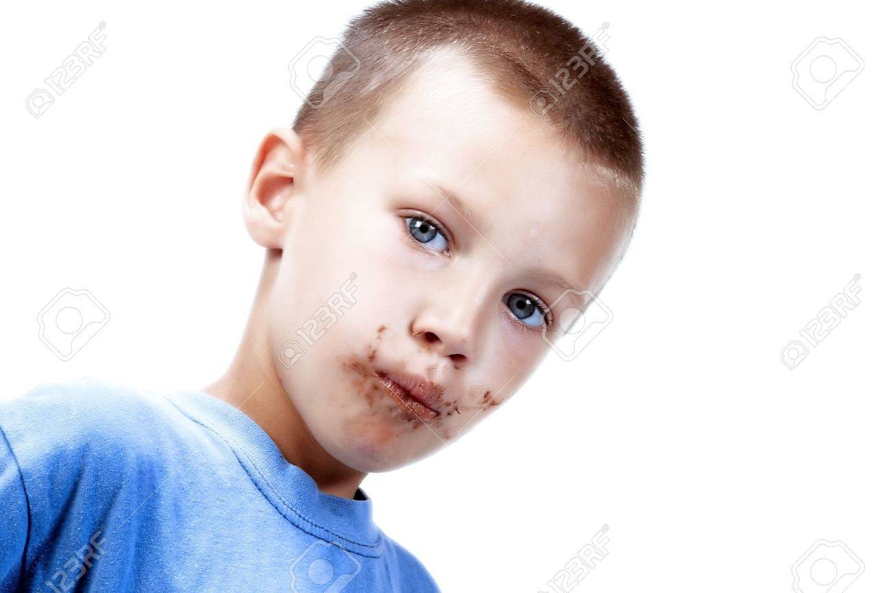 6514581-kid-eating-chocolate--while-smearing-his-face-with-choclate.jpg