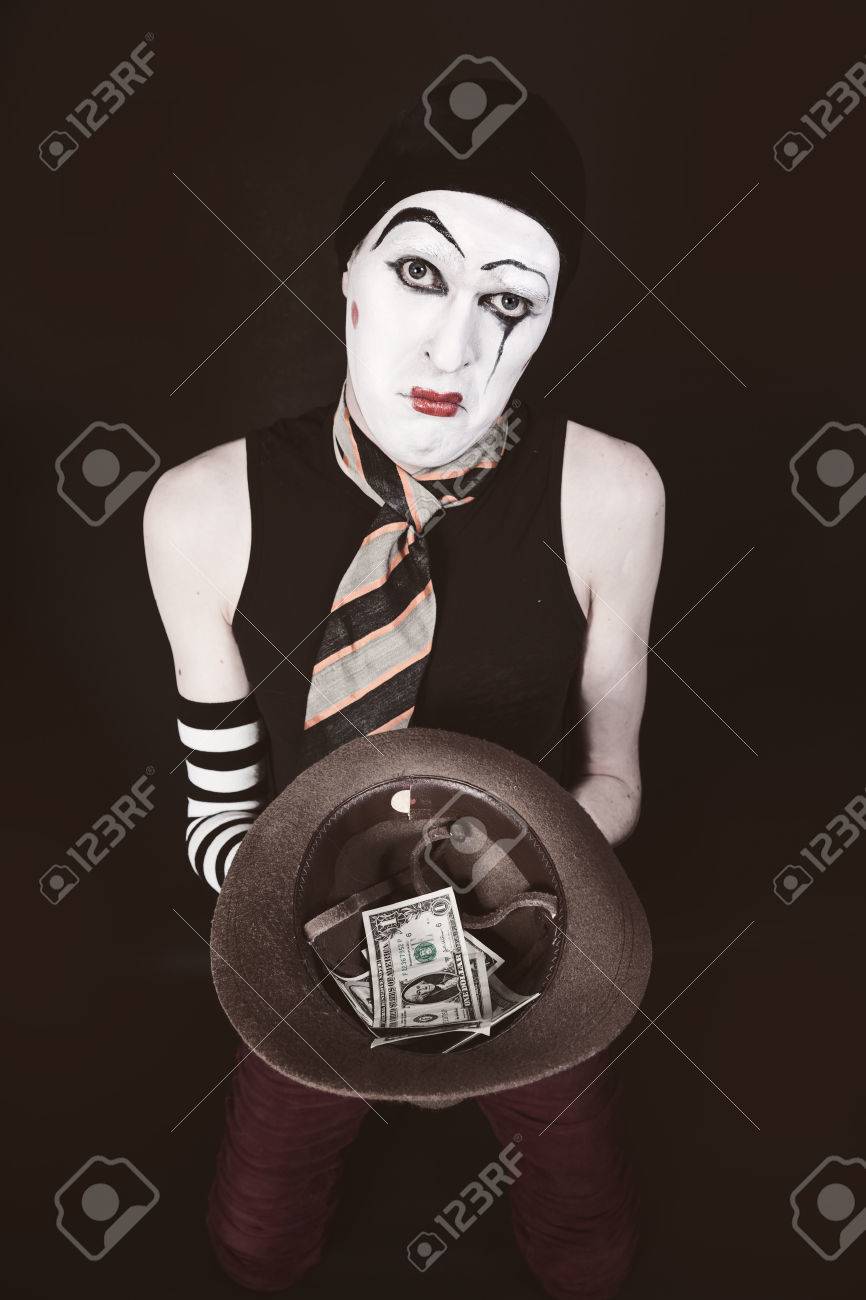 58293280-Mime-with-hat-in-hand-begging-closeup-Stock-Photo.jpg