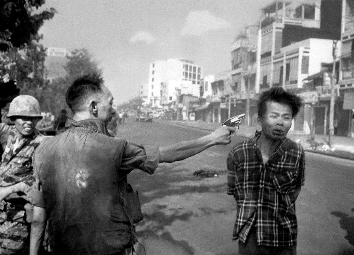 this-picture-that-won-legendary-photojournalist-eddie-adams-the-pulitzer-prize-in-1969-depicts-south-vietnamese-gen-nguyen-ngoc-loan-chief-of-the-national-police-as-he-fires-his-pistol-shooting-and-killing-suspected-viet-cong-officer-nguyen-van-lem-also-known-as-bay-lop-on-a-saigon-street-in-1968-early-in-the-tet-offensive.jpg