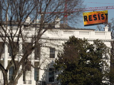 a-70-foot-resist-banner-is-hanging-near-the-white-house.jpg