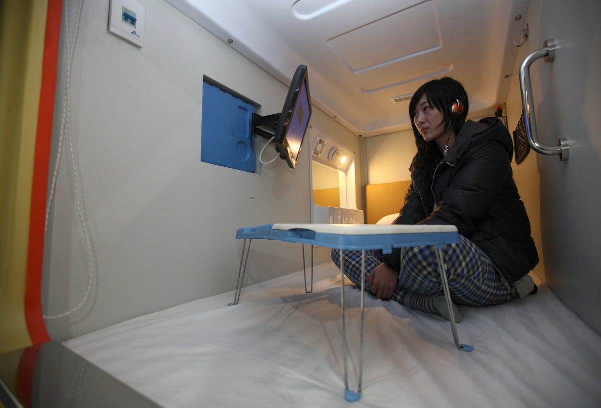 a-capsule-hotel-in-china-within-the-city-of-qingdao-packs-an-lcd-tv-into-each-of-its-2-by-1-meter-spaces.jpg