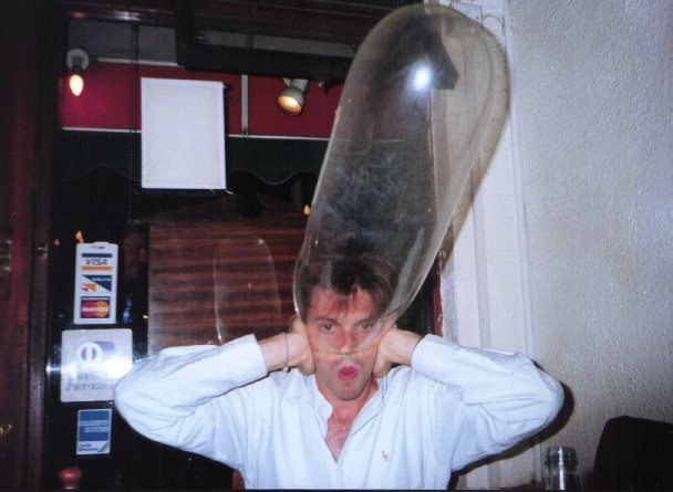condom-being-inflated-over-mans-head.jpg