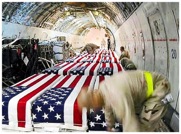 coffins-of-u-s-soldiers-inside-a-cargo-plane-at-kuwait-international-airport-in-april-2004.jpg