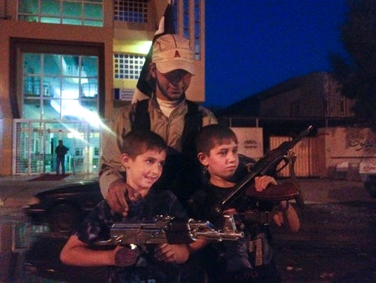 635523369673453848-AP-Mideast-Islamic-State-Child-Soldiers-001.jpg