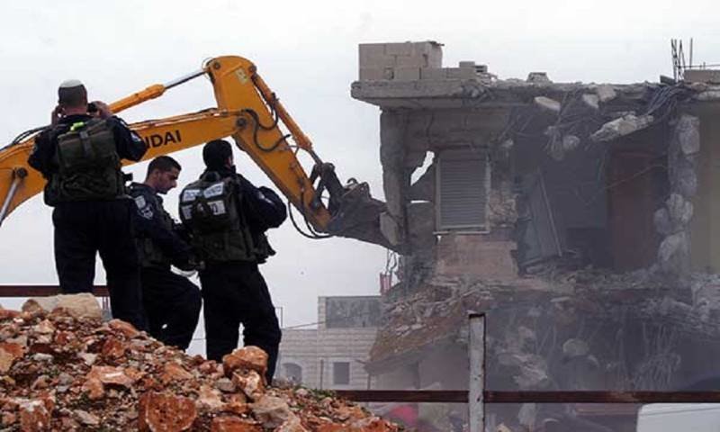 israeli_bulldozers_demolishing.jpg