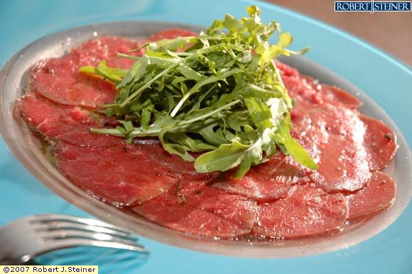 raw_beef_carpaccio_with_argula__shaved_parmesan