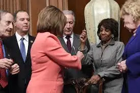 Nancy Pelosi hands out impeachment pens, a signing tradition ...
