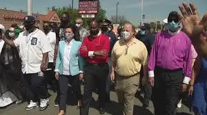 Gov. Whitmer marches in unity walk Thursday ahead of night 7 of ...