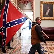 january 6 2021 democrat carrying confederate flag from www.cnbc.com