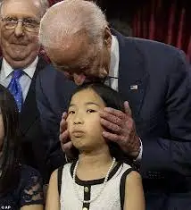 Creepy Joe Biden leans in grabs teen girl's shoulder to tell her 'no  serious guys until you're 30' | Daily Mail Online