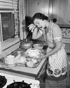 1950s-tired-exhausted-woman-housewife-sink-full-of-dirty-dishes-h28671.webp
