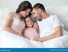 a family in bed.webp