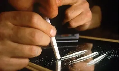 A-man-snorting-cocaine-001.webp