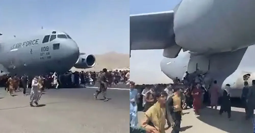 afghans-clinging-plane.webp