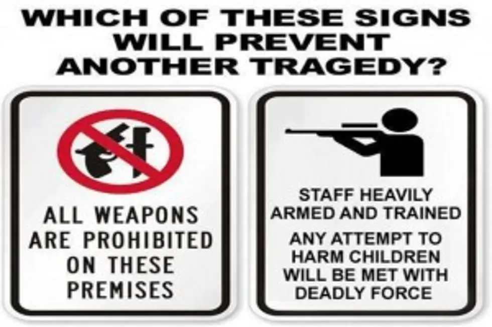 armed teachers sign.webp