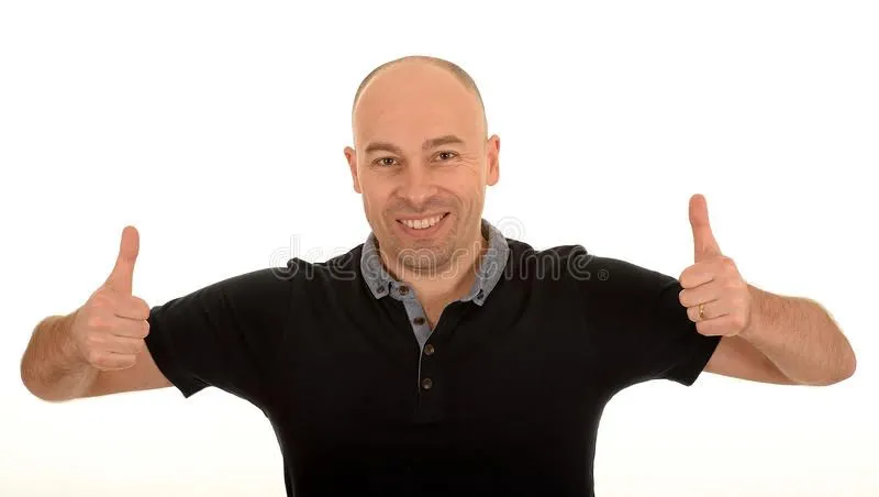 bald-man-thumbs-up-happy-white-studio-background-38352177.webp