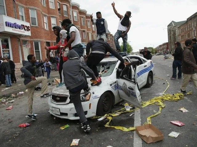 baltimore-riot-police-car-AFP-640x480.webp