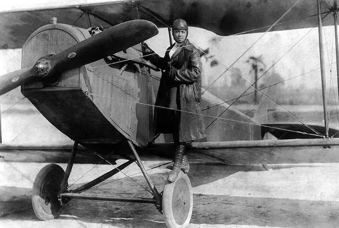 Bessie-Coleman-and-her-Jenny-1922.webp