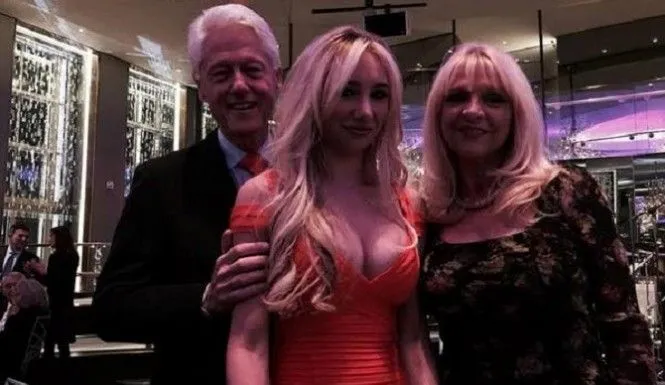 Bill-Clinton-with-young-blonde.webp