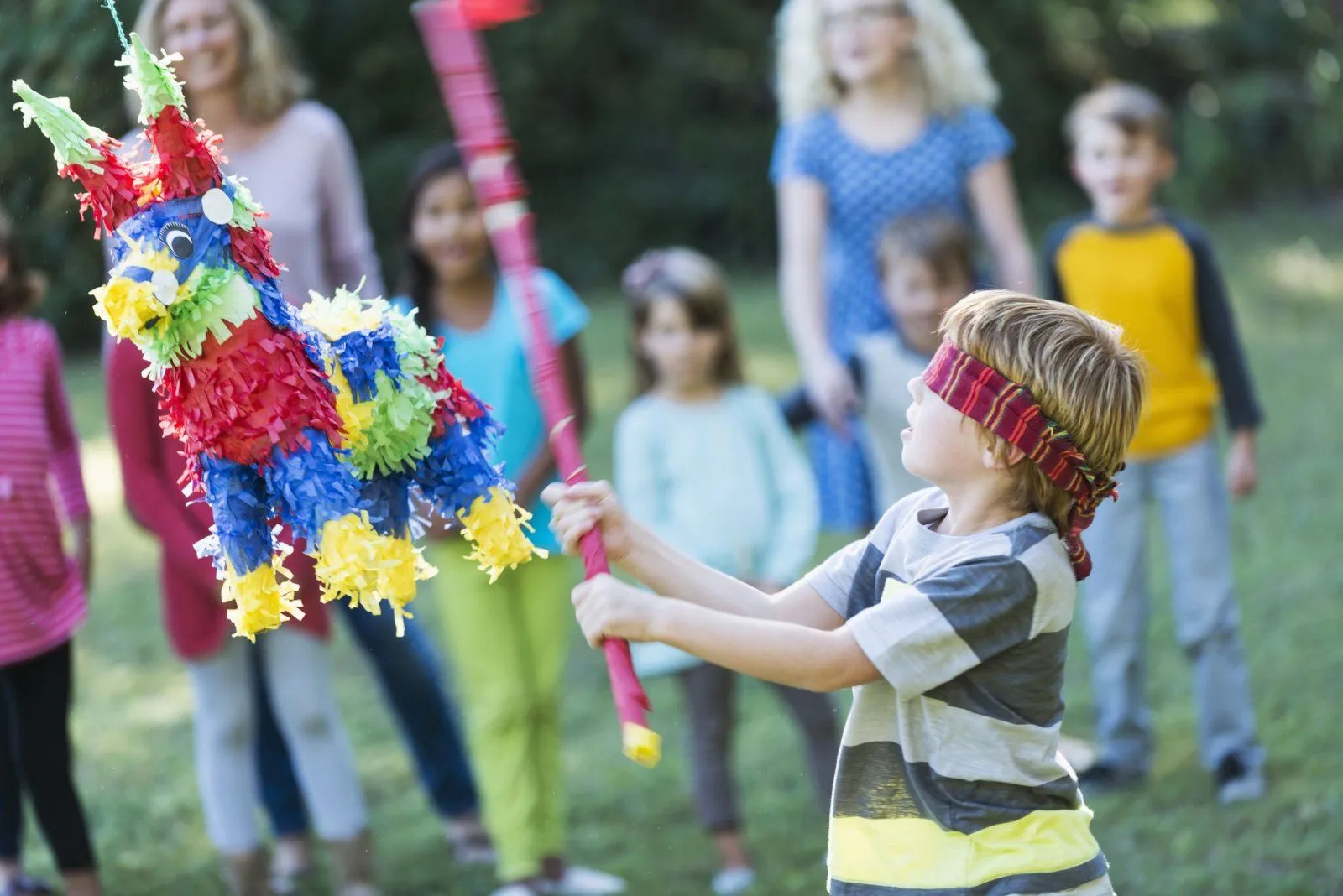 Boy-hitting-pinata-GettyImages-473042962-589010355f9b5874ee94dc8a.webp
