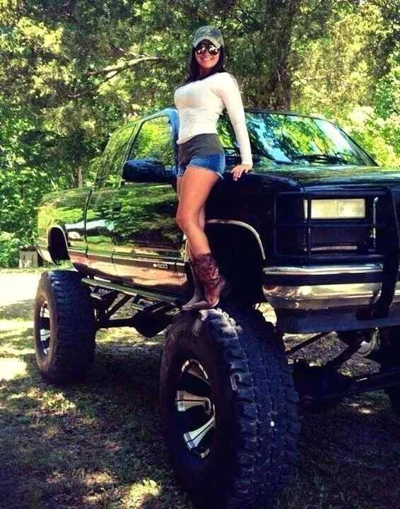 country-girls-and-trucks-girl-lifted-gm-diesel-cool-pickup-home-improvement-neighbor-fence.webp