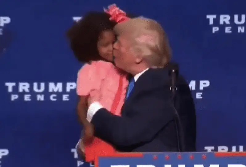 donald-trump-kissing-girl.webp
