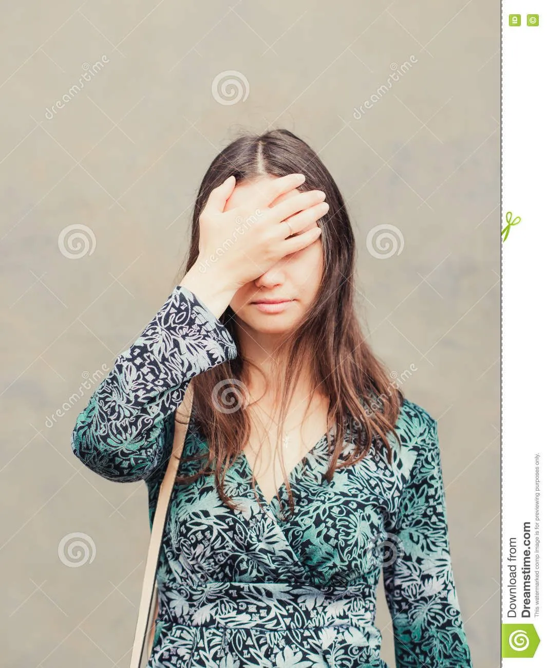 facepalm-girl-portrait-young-woman-doing-posing-against-gray-wall-background-vertical-76500435.webp