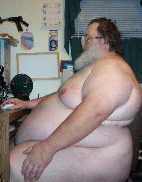 fat_man_at_computer.webp