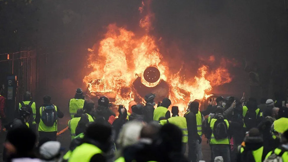 franceee-fuelll-protests-tear-gas-fired-in-ccclashes-in-parisssss.webp