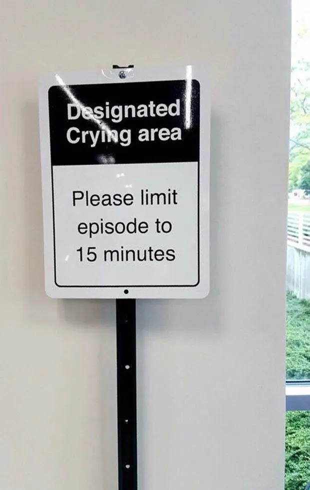 funny-signs-designated-crying-area.webp