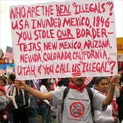 immirationracistsignsrealillegals.webp